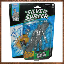 Load image into Gallery viewer, Marvel Legends Silver Surfer action figure in packaging on a white background
